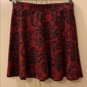 Red and black floral print skirt